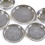 A group of Iranian silver bowls and coasters, largest diameter 10cm, 10.1oz total (6)