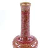 A Chinese red mottle glazed porcelain narrow-necked vase, 6 character mark, height 29cm