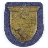 A German Kuban Shield badge, dated 1943