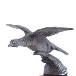 An early 20th century nickel plate bronze pheasant design car mascot, length 12cm