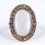A large unmarked gold opal and white stone cluster dress ring, setting height 37.4mm, size Q, 14g
