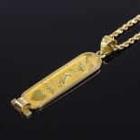 An Egyptian unmarked gold pendant, on 14ct rope twist chain, pendant height excluding bale 46mm,