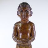 An Indian carved and painted wood standing boy figure, 18th or 19th century, height 44cm