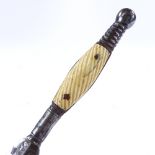 An 18th century dagger, with ivory grips and engraved blade, length 30cm