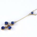 An Edwardian 15ct gold sapphire and diamond drop pendant cross necklace, pendant height 47.1mm,
