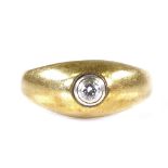 A 14ct gold solitaire diamond gypsy ring, setting height 8.5mm, size P, 5.8g