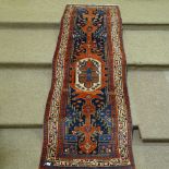 A Persian Meshkin long rug, early 20th century, 9'10" x 3'4"