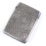 A late Victorian silver card case, engraved foliate decoration, by William Thorneywork, hallmarks