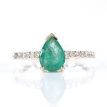 A 14ct gold solitaire emerald ring, with diamond set shoulders, pear-cut emerald approx 0.76ct,