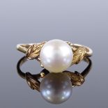 A 14ct gold Mikimoto whole cultured pearl dress ring, pearl diameter 7.6mm, size M, 2g