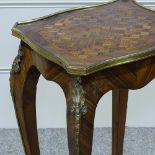 A French kingwood occasional table, with parquetry top and ormolu mounts, 10" across, height 21"