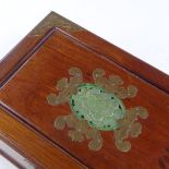 A Chinese brass-bound mahogany jewel box, with inset green stone plaque to the lid, width 30cm