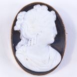 A relief carved cameo brooch, depicting female Classical portrait, in unmarked gold frame, brooch