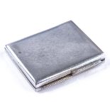 A Van Cleef & Arpels stainless steel postage stamp holder, length 27mm, 7.4g