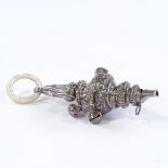 A George V silver baby's whistle/rattle, with mother-of-pearl teether, by E S Barnsley & Co,