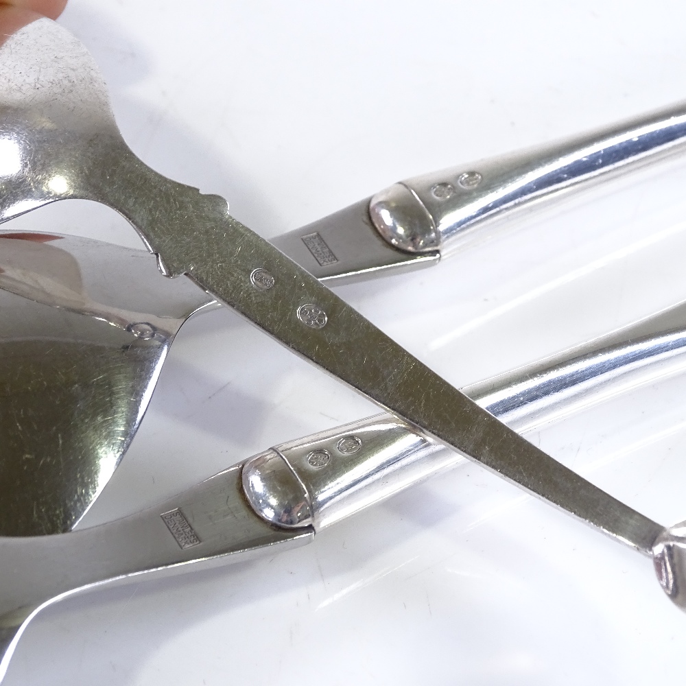 A stylised silver spoon by W & S Sorensen, together with a pair of silver-handled servers by the - Image 2 of 3