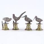 A set of 4 Edwardian silver game bird design name place markers/menu card holders, with heavy cast-