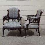 A pair of Victorian carved mahogany bow-arm fireside chairs
