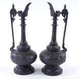 A pair of 19th century patinated spelter ewers on marble bases, height 27cm