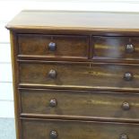 A Victorian mahogany chest of 3 long and 2 short drawers, with panelled drawer fronts, width 4',