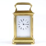 A miniature French brass-cased carriage clock, case height 7cm