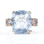A 14ct gold 3-stone aquamarine and diamond ring, cushion-cut aquamarine approx 5.25ct, total diamond