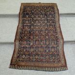 A Persian handmade wool rug, 6'10" x 3'9"