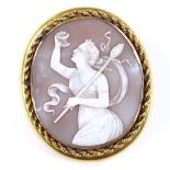 A 19th century relief carved cameo brooch, depicting half length Classical portrait, in a rounded-