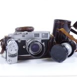 A Leica M2 camera, serial no. 936958, with original Leica lens, Leica top-mounted light meter, and