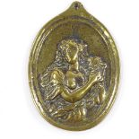 An 18th century relief moulded brass plaque, depicting a Classical figure, height 13cm