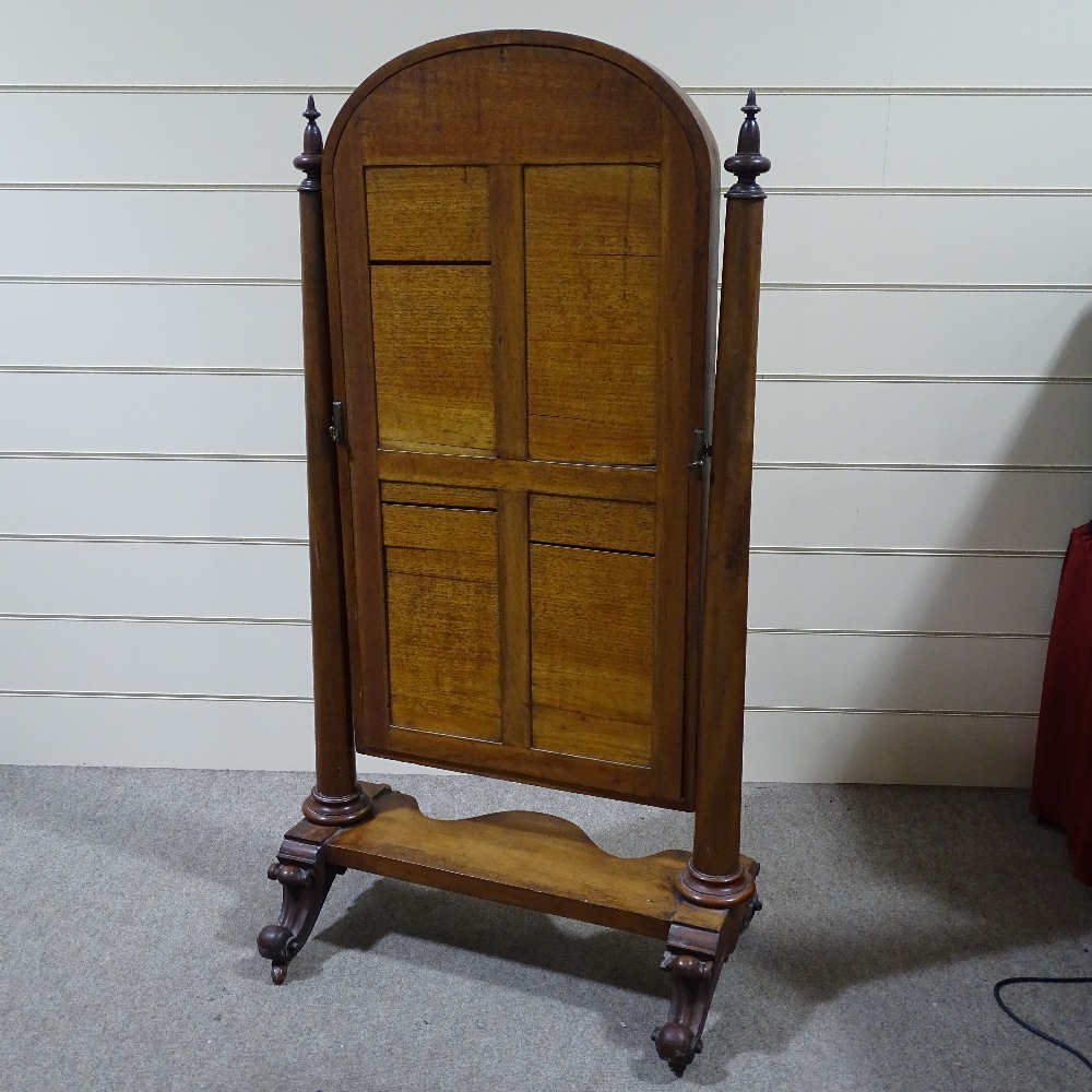 A Victorian mahogany arch-top cheval mirror, with turned tapered columns and carved base, mirror - Image 4 of 4