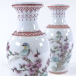 A pair of Chinese Republic white glaze porcelain vases, with hand painted birds and blossom, painted