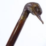 A walking cane, circa 1900, with bronze bird's head handle