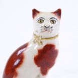 A 19th century Staffordshire Pottery seated cat, height 10cm