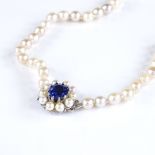 A graduated single strand Princess cultured pearl necklace, with 9ct white gold synthetic sapphire