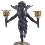 A pair of 19th century bronze twin-branch candelabra, supported by winged cherub figures, parcel-