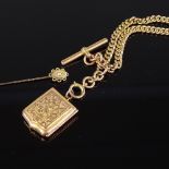 A 9ct gold curb link chain, with 2 dog clips, T-bar, and 9ct back and front locket, chain length