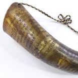 A Scrimshaw buffalo horn with engraved military inscriptions, length 32cm