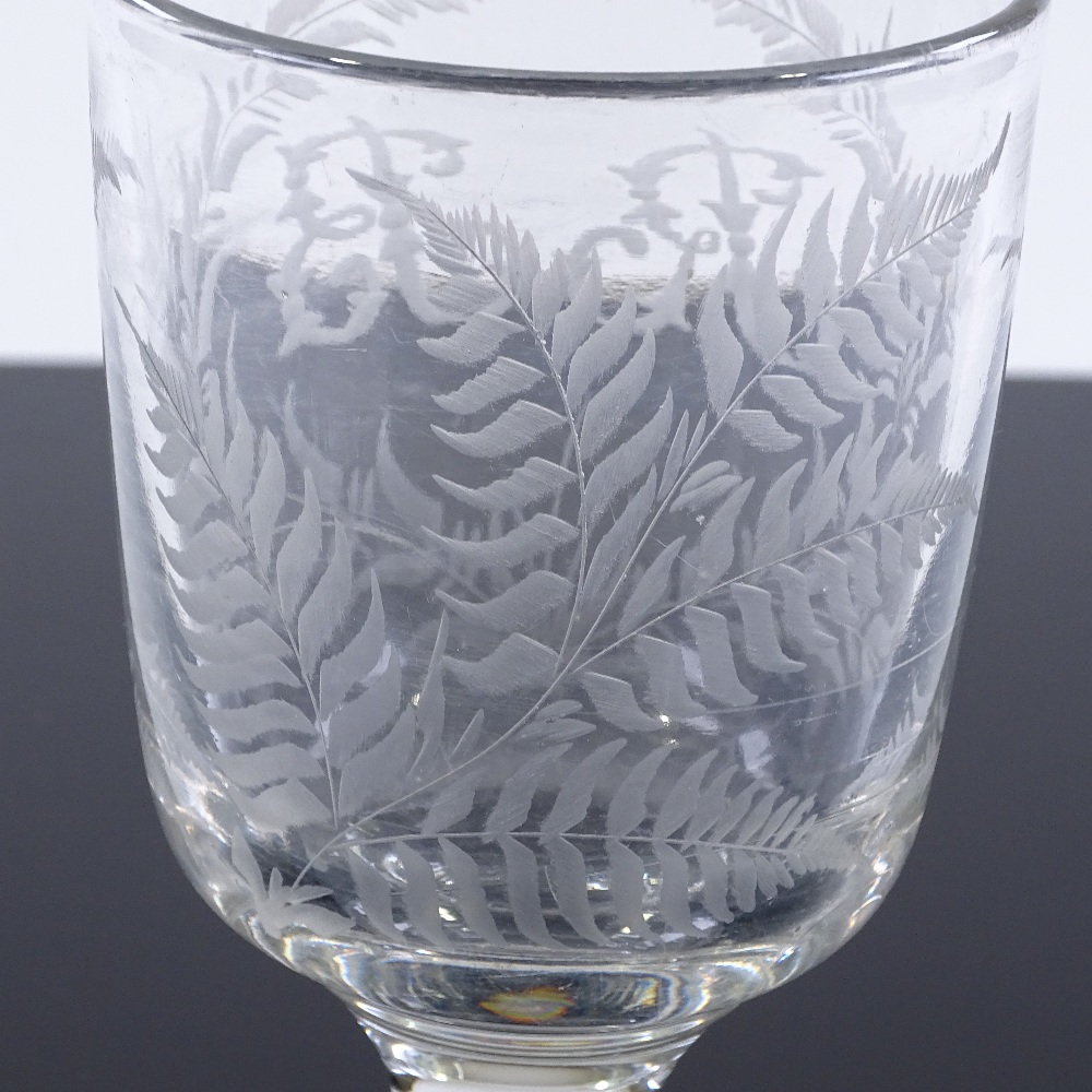 A 19th century hand made ale glass with etched fern designs, height 17cm - Image 2 of 3