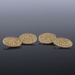 A pair of 9ct gold oval engraved cufflinks, maker's marks WO, panel length 17.2mm, 6g total