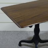 A Victorian mahogany breakfast table on tripod base, 2'11" x 2'3"
