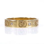 A Gucci 18ct gold diamond wedding band ring, with Gucci emblem decoration, band width 4mm, size M,