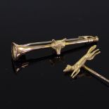 Hunting jewellery - a 15ct gold running fox tie/stickpin, with textured finish, length 56.4mm, 2.3g,