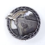 A German Blockade Runners badge with maker's marks, length 5cm