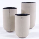 Louise Darby (British - born 1957), 3 graduated Studio pottery cylinder vessels, with incised and