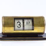 A mid-20th century brass drum-cased flip numeral desk clock, by Endura (West Germany), base length