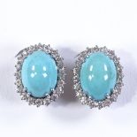 A pair of unmarked white metal cabochon turquoise and diamond cluster earrings, with spiral
