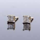 A pair of 14ct gold Princess-cut solitaire diamond earrings, with stud fittings, diamond measure: