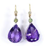 A pair of amethyst, peridot and diamond drop earrings, with unmarked gold shepherd hook fitting,