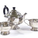 A 3-piece circular silver tea set, of plain form, with bead edge, teapot height 14cm, 20.7oz total